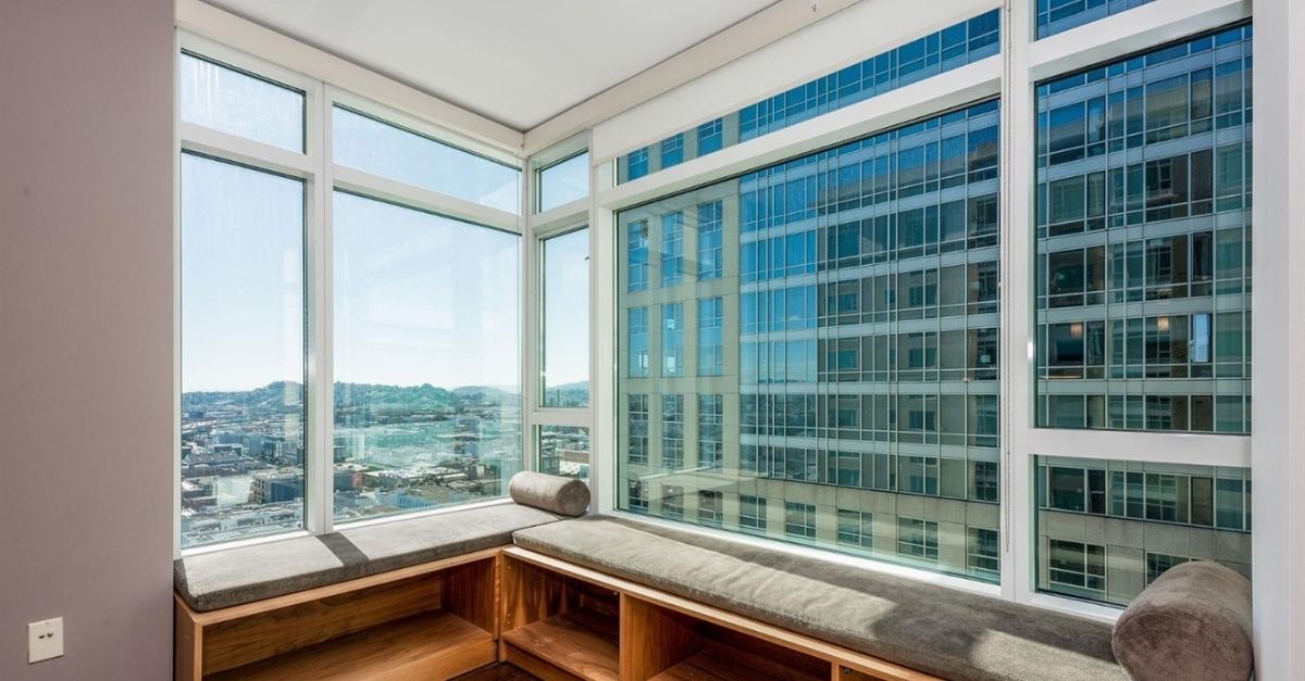 Built-in window seat of San Francisco condo with views through large windows 