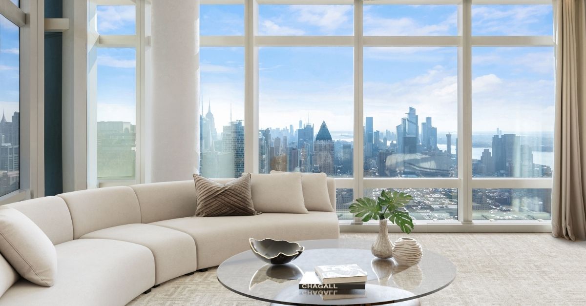White living room overlooking New York City skyline