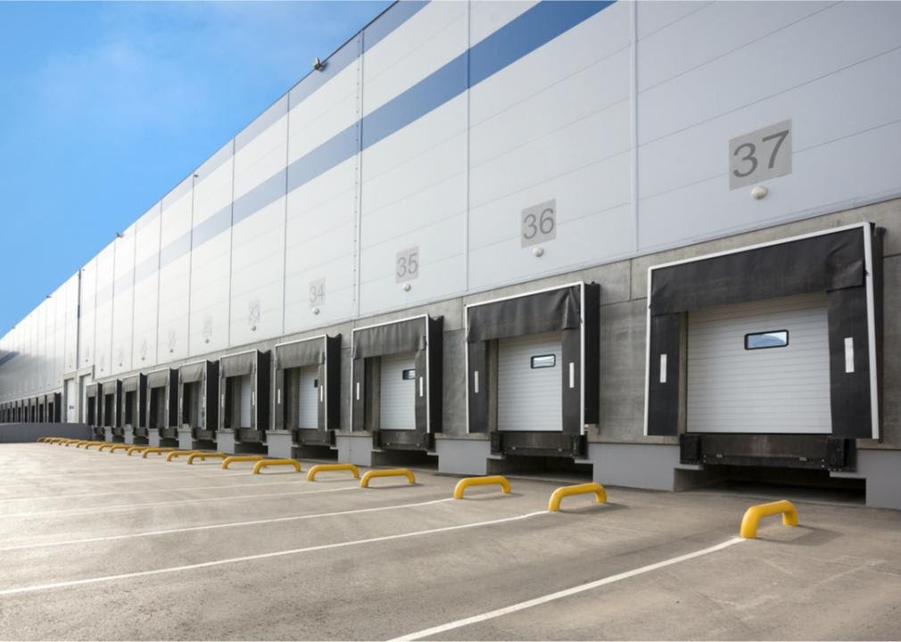 Large warehouse with loading bays for vans