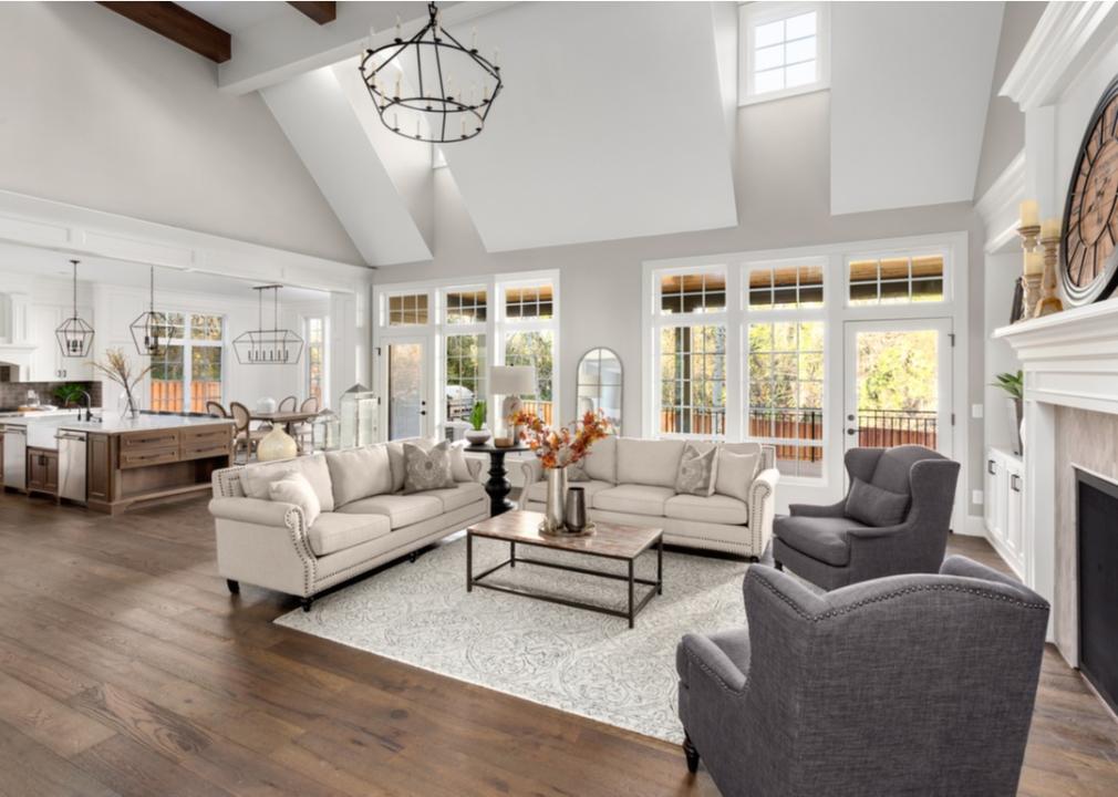 Large living room with high ceilings and lots of natural light
