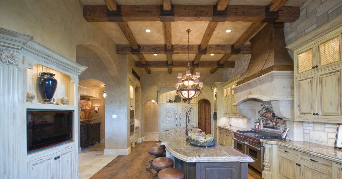 Kitchen with wood beams on ceiling