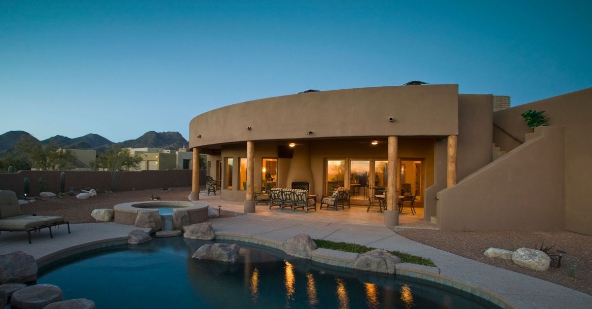 Pueblo style house with pool