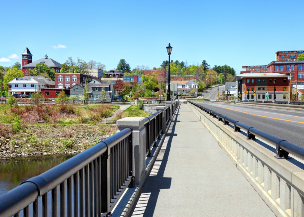 Plymouth, New Hampshire buildings and homes from the view of a pedestrian bridge.